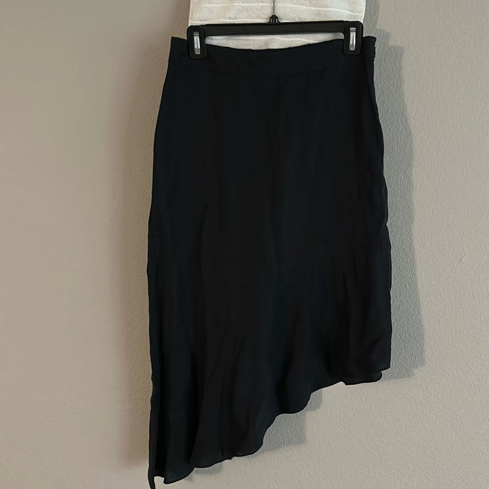 Saks Fifth Avenue 
Small black linen skirt

Clean closet
Smoke free pet free